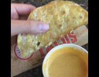 DIPPING JIM BOYS TACOS INTO QUESO CHEESE