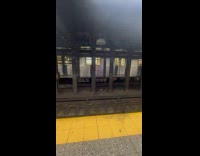 Abandoned baby doll on subway train tracks