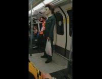 Person with michael meyers costume stands still