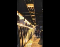 Guy stands on roof of train and dances 
