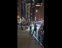 Crowd of skaters passing by on street
