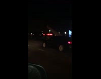 Collab Kook Of The Day - black car with surfboard coming out of moonroof