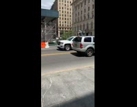 UHaul truck carries statue of The Kiss couple V-J Day Times Square in trunk