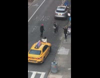 Girl white sleeves sit on taxi street