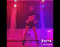 Guy dances to Britney Spears song and falls on his butt