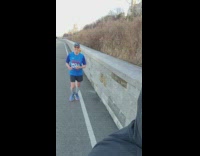 Guy juggling while running