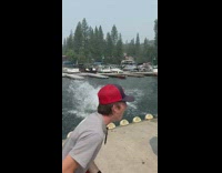 Red shorts guy backflip blue white building