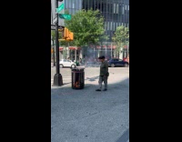Woman stare at garbage burn in trash can part 2