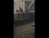 Trio dances in airport 