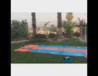 Son gets thrown onto slip and slide 