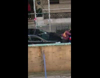 Man and woman fights on the street 