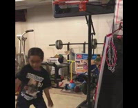 Little boy sings and does tricks from Harlem Globetrotters 