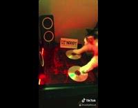 Cat DJs dances party flashing lights filter 