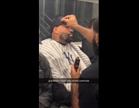 Man gets beard shaved in subway ride