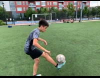 Kid kicks ball and hits shirtless man