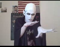 Dracula vampire guy with long black nails white makeup dances to halloween song criss angel shirt poster