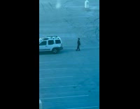 Woman leather jacket tiktok rooftop parking lot