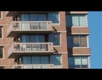 Man Jogs Back and Forth Across his Balcony 