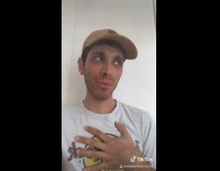 White hard rock shirt guy lip syncs