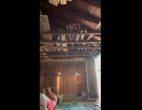 Woman clings on aerial hoop falls down