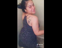 Blue white dress girl twerks back tattoo