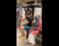 Man on bench look at photography film