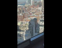 Man green shoes dance on building rooftop