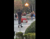 Man pogo sticking around washington square park