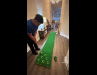 Collab ClipsIG - Two men plays putt golf on hallway