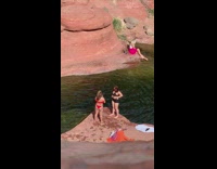 Two women red and black bikini river rock Part 2