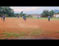 Guy slides on ground soccer training day