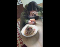 Girl getting perfect pic pancakes