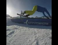 Ski ramp slide fail yellow pants blue shirt