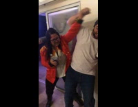 Woman kicks beer bottle out of guys hand at party