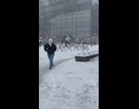 Martial arts class outdoors in snowstorm