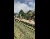 Two men tiktok dance at the train station Part 2