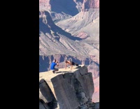 Man shirtless pushup video edge of cliff