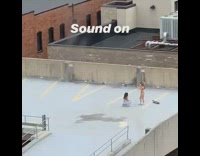 Man filmer narrates mock two women roof pictorial