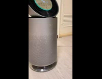 Cat beside fan then lay on bed