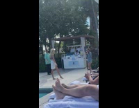 Woman blue bikini pool management stops them