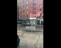 Man sit on luggage pulled by car