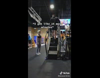 Group of people join guy on stairmaster