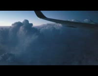 Airplane plane flies over clouds lightning wing