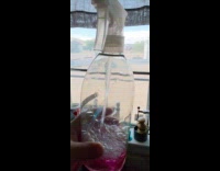 FIlmer shows bubbles inside of spray bottle