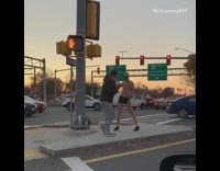 Guy dances with shirtless guy runs away 