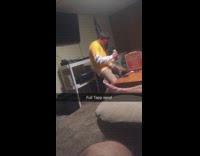 Music Guy in a yellow shirt throws a pizza box 