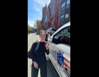 Woman avoids car being towed playing rock paper scissors