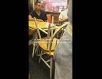Man brings dinner table and chairs with him onto the subway