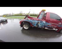 Red tow truck with grim reaper paint 