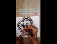 Artist draws girl wearing hijab on paper 